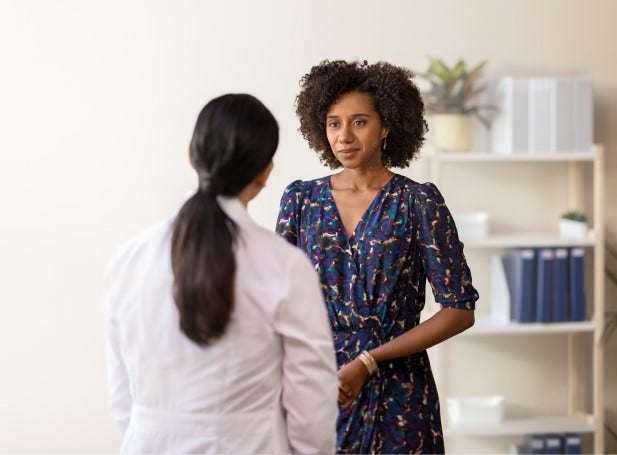 Patient talking to doctor